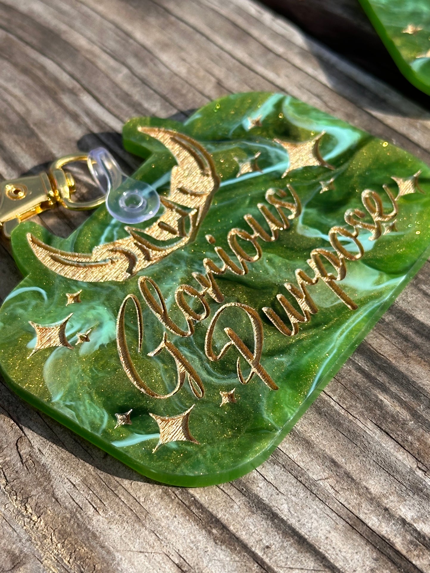 Glorious Purpose keychains on specialty cast acrylic with gold paint fill