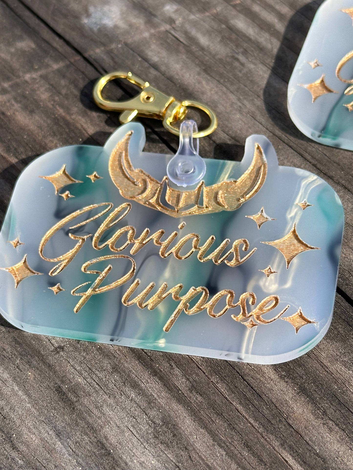 Glorious Purpose keychains on specialty cast acrylic with gold paint fill